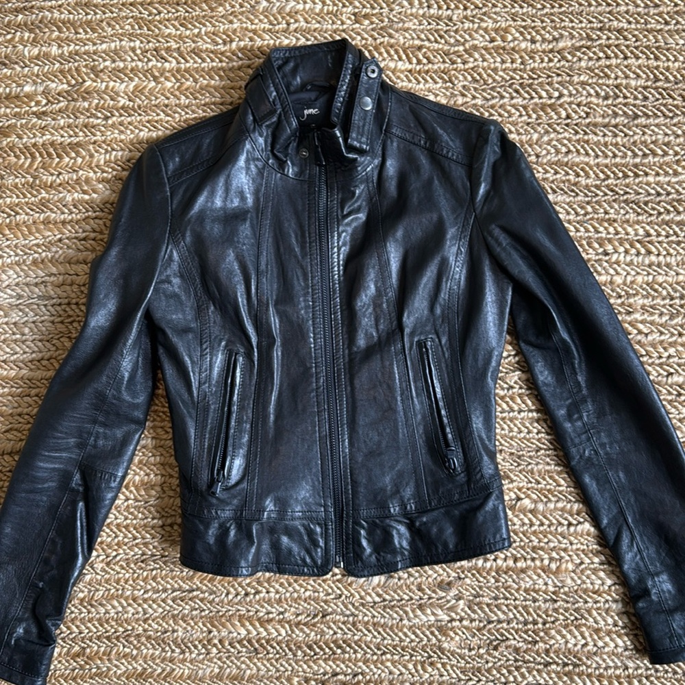 100% Leather jacket by June. Size x-small in black.